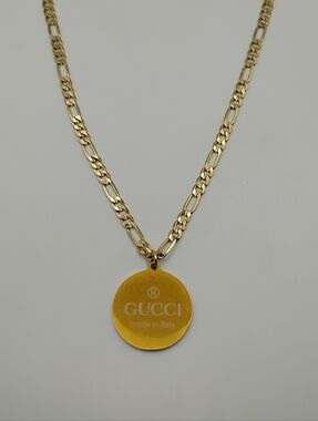 Gucci Gold Tone Logo Charm On A 14K Necklace